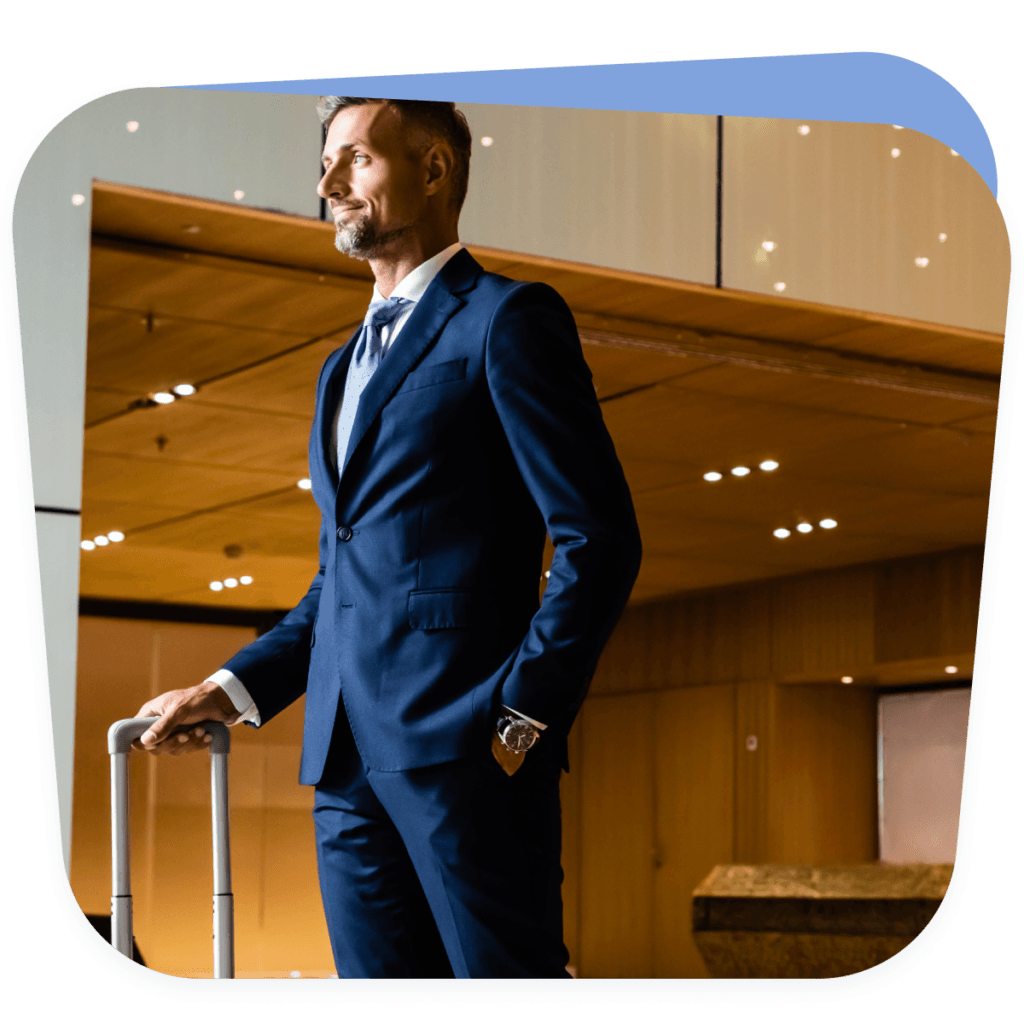 businessman standing in hotel lobby