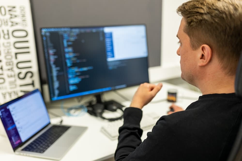 developer at his desk coding things