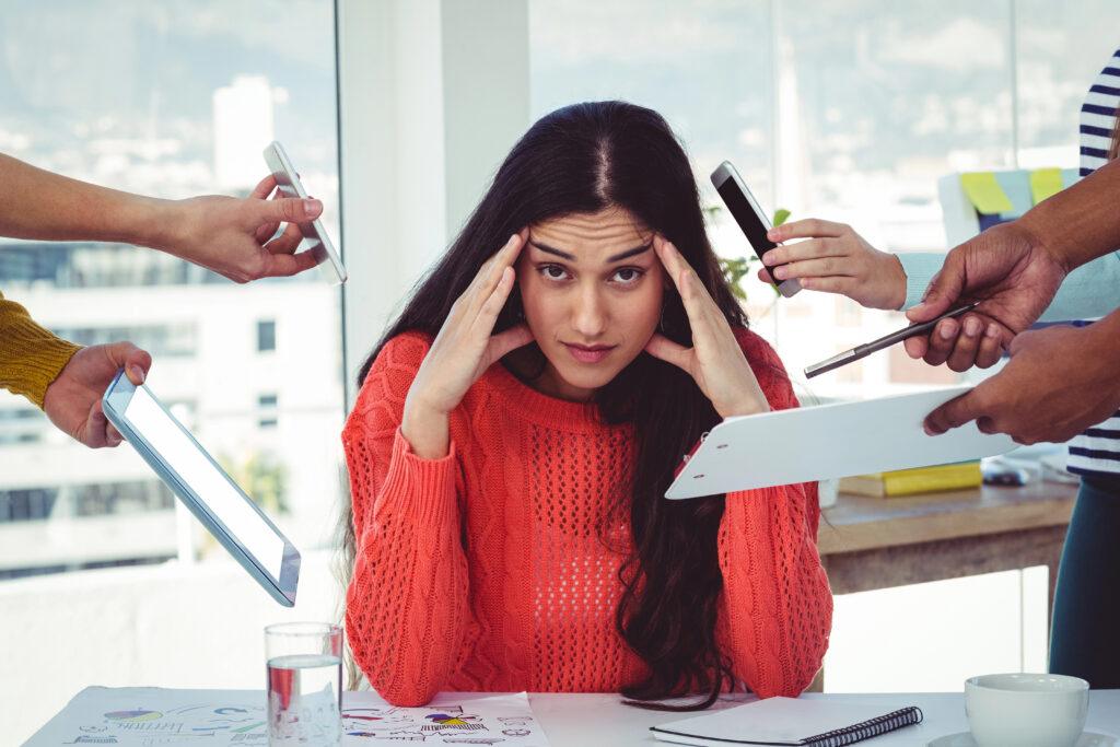 everybody demanding attention from a stressed woman