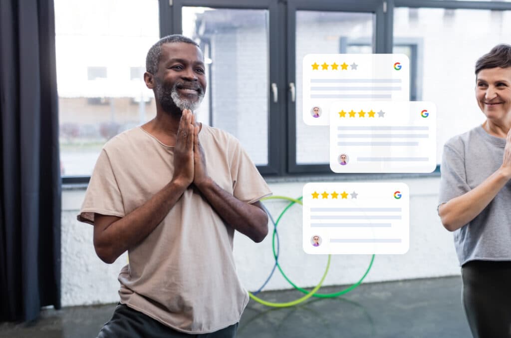 smiling african american man doing namaste greeting