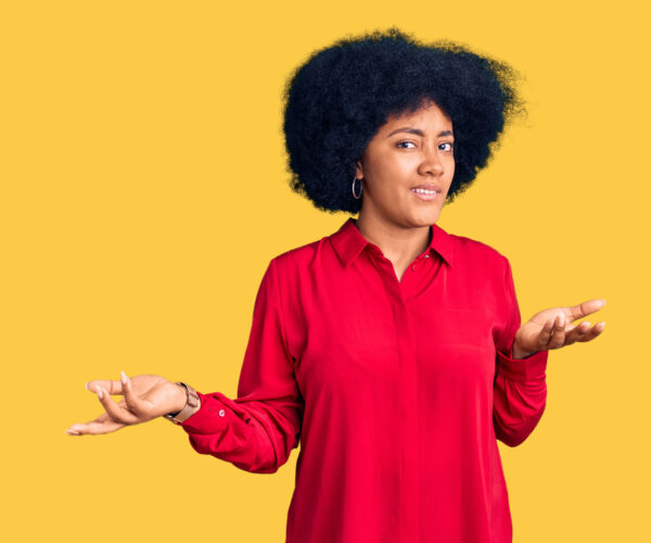 Young african american girl wearing casual clothes clueless and confused with open arms, no idea concept.