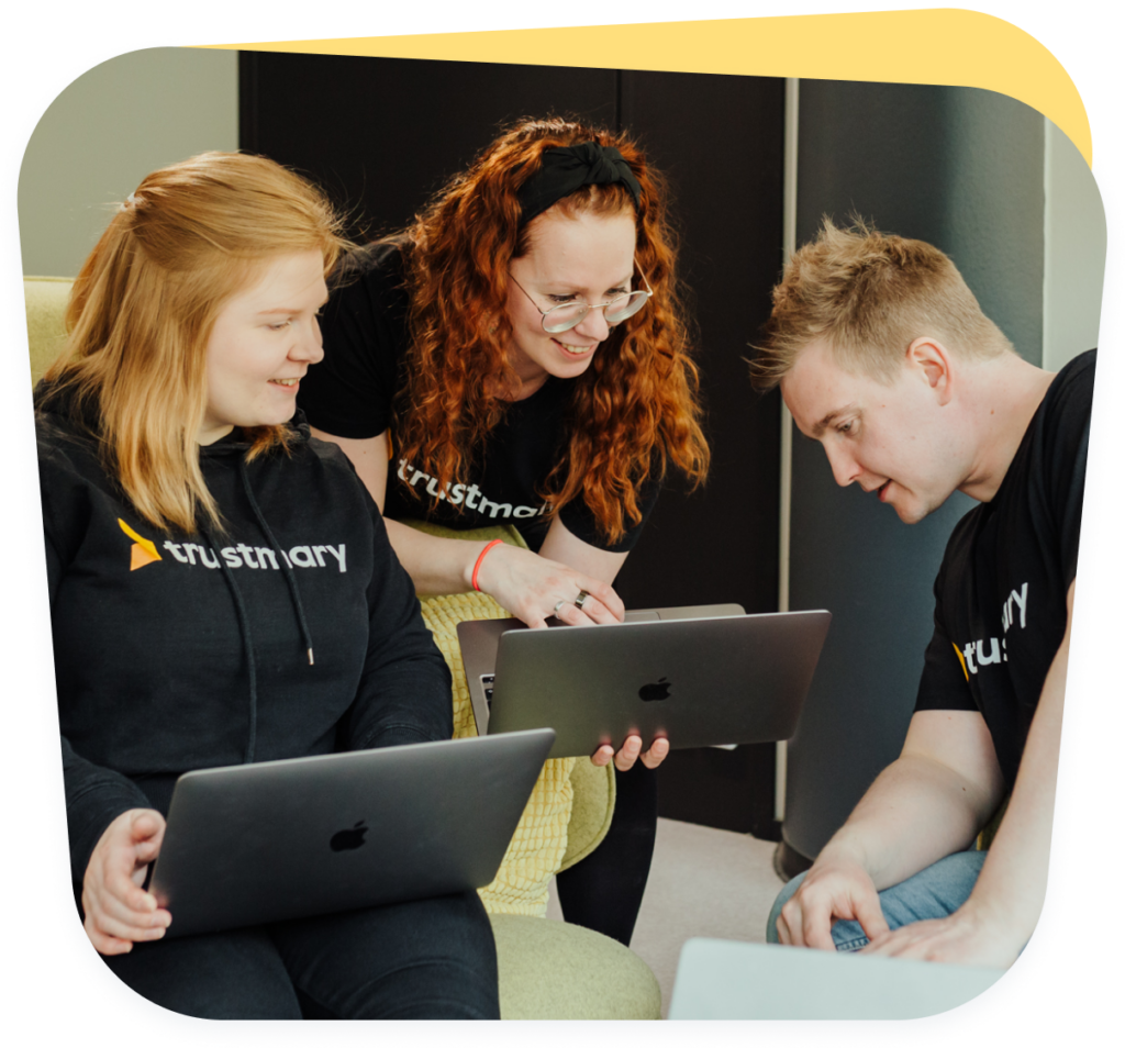 three people comparing solutions and sharing experiences