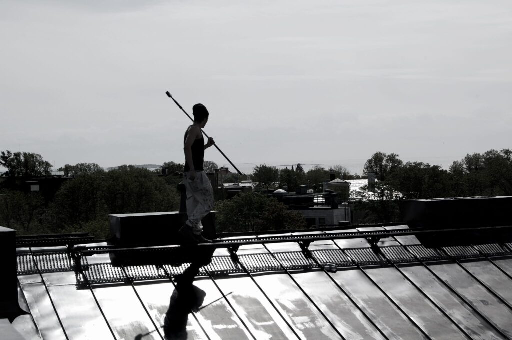 johannes karjula working on a roof in 2009